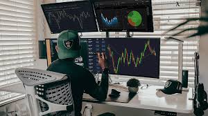 crypto trader at workstation